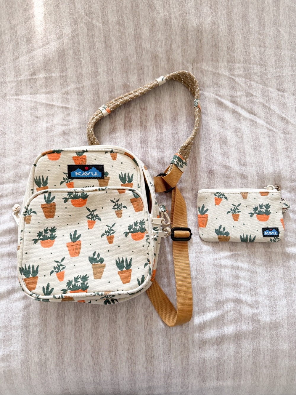 Kavu Sling Sling Crossbody Bag with Orange & Green Plant Print